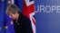 British Prime Minister Theresa May leaves after addressing a media conference at an EU summit in Brussels, March 22, 2019. 