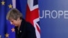 FILE - British Prime Minister Theresa May leaves after addressing a media conference at an EU summit in Brussels, March 22, 2019. 