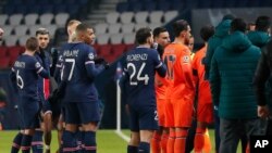 Soccer match between Paris Saint Germain and Istanbul Basaksehir whose assistant coach Pierre Webo was shown a straight red card in the 16th minute before the players refused to continue the match amid allegations of racism by one of the match officials.