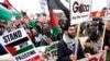 FILE - Pro-Palestinian demonstrators march during a visit by President Joe Biden in Warren, Mich., Feb. 1, 2024.