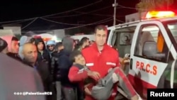 FILE - Aftermath of what the Palestine Red Crescent Society says was Israeli shelling in a location given as Nuseirat camp, Deir Al-Balah, in this screengrab taken from a video released on December 30. 2023.