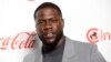 FILE - Kevin Hart, recipient of the CinemaCon international star of the year award, poses at the Big Screen Achievement Awards at Caesars Palace in Las Vegas, April 4, 2019.