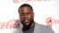 FILE - Kevin Hart, recipient of the CinemaCon international star of the year award, poses at the Big Screen Achievement Awards at Caesars Palace in Las Vegas, April 4, 2019.