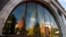 The walls and towers of the Kremlin are reflected in a window of a closed McDonald's restaurant, one of four temporarily closed by the state food safety watchdog, in Moscow, August 21, 2014.