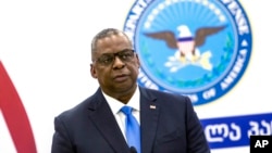 U.S. Defense Secretary Lloyd Austin speaks to the media during a joint news conference with Georgian Minister of Defense Juansher Burchuladze after their talks in Tbilisi, Georgia, Oct. 18, 2021. 