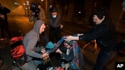 Iraq War veteran Scott Olsen with fractured skull after Oakland police enforce illegal camping law, October 25, 2011.