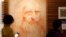 Visitors look at a portrait drawing of Italian Renaissance painter, scientist and inventor Leonardo Da Vinci during a permanent exhibition on Da Vinci, on the exact day commemorating the 500th anniversary of his death, in Rome, Thursday, May 2, 2019. 