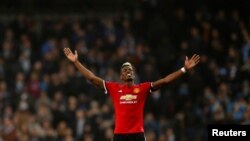 Paul Pogba de Manchester United jubile après la victoire de son équipe contre Manchester City 3-2 au Stade Etihad, Manchester, 7 avril 2018.