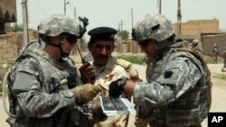 A US soldier on patrol in Kirkuk, July 20, 2011