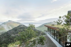 This image released by Anacapa Architecture shows the view from an off-grid guest house in Hollister Ranch, Calif., one of the last remaining undeveloped coastal areas in California, located on a wildlife preserve. (Erin Feinblatt via AP)