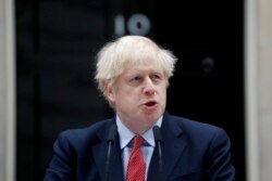 British Prime Minister Boris Johnson makes a statement on his first day back at work in Downing Street, London, after recovering from a bout with the coronavirus that put him in intensive care, Monday, April 27, 2020. The highly contagious COVID-19…
