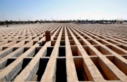 IRAN -- A general view of empty prepared graves at the Behesht Zahra Tehran’s main cemetery in southern of Tehran, October 21, 2020.