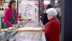 The Paris agricultural fair is a time for French to reconnect with their roots, and local gastronomy. (Lisa Bryant/VOA)