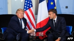 Serok Donald Trump û Emmanuel Macron, di dema Hilcivîna G7 li Evian, navenda  rojhilatê Frensayê Hezîran 15, 2026.
