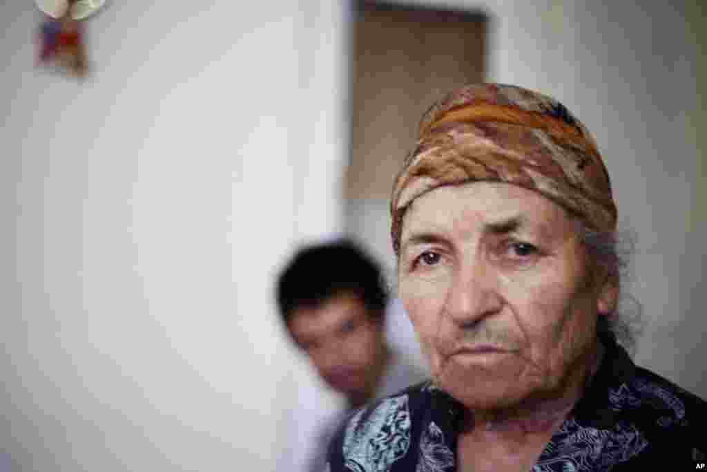 Neli Kazeshvili, 72, moved to the refugee village from Eredvi village, South Ossetia. (Yuli Weeks for VOA)