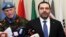 Lebanese Prime Minister Saad Hariri, right, speaks to journalists, as he stands next of Head of Mission and Force Commander of UNIFIL, Maj. Gen. Michael Beary, left, at U.N. peacekeepers headquarters, at the coastal border town of Naqoura, south Lebanon, April 21, 2017. 