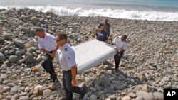 A ball of fire rises from a building following a reported airstrike by Syrian government forces on a rebel-held area in the southern city of Daraa.
