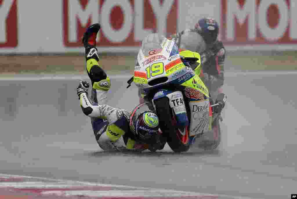 Moto 2 rider Xavier Simeon of Belgium falls off his bike during the San Marino Motorcycle Grand Prix at the Misano circuit in Misano Adriatico, Italy.