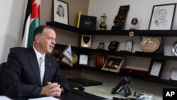 Prince Feisal al-Hussein, brother of Jordan's King Abdullah II, speaks during an interview with The Associated Press in Amman, Jordan, Nov. 25, 2015.