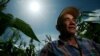 Archivo - El agricultor Santiago Valladares es visto frente a su cosecha de maíz en Jutiapa, Guatemala, el 28 de julio de 2005.