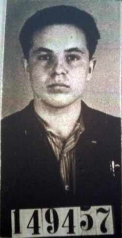 FILE - This undated file photo shows Michael Karkoc, which was part of his application for German citizenship filed with the Nazi SS-run immigration office on Feb. 14, 1940.