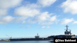 FILE - USS Ronald Reagan (CVN-76), a Nimitz-class, nuclear-powered supercarrier and USS Carl Vinson are seen in San Diego, California. (Photo: Diaa Bekheet) 