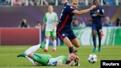 FILE - Olympique Lyonnais faces off against VfL Wolfsburg in the women's Champions League final at Valeriy Lobanovskyi Stadium, Kyiv, Ukraine, May 24, 2018.