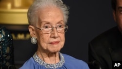 FILE - Former NASA mathematician Katherine Johnson, the inspiration for the film "Hidden Figures," poses in the press room at the Oscars at the Dolby Theatre in Los Angeles, California, Feb. 26, 2017.