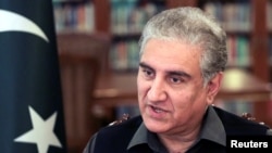 FILE - Pakistan's Foreign Minister Shah Mehmood Qureshi speaks during an interview with Reuters at the Ministry of Foreign Affairs in Islamabad, Pakistan, March 1, 2020.