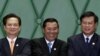 Prime Ministers, from left, Thein Sein of Myanmar, Nguyen Tan Dung of Vietnam, Hun Sen of Cambodia, and Bouasone Bouphavanh of Laos, shake hands during an opening ceremony of the 5th Cambodia, Laos, Myanmar and Vietnam summit in the Cambodia's Peace Palac