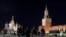 Law enforcement officers wearing face masks walk across Red Square amid the outbreak of the coronavirus disease (COVID-19) in Moscow, Russia October 25, 2021.  REUTERS/Shamil Zhumatov