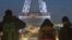 The words "Thank you Johnny" is displayed on the Eiffel Tower referring to late French rock star Johnny Hallyday in Paris, France, Friday, Dec. 8, 2017. 
