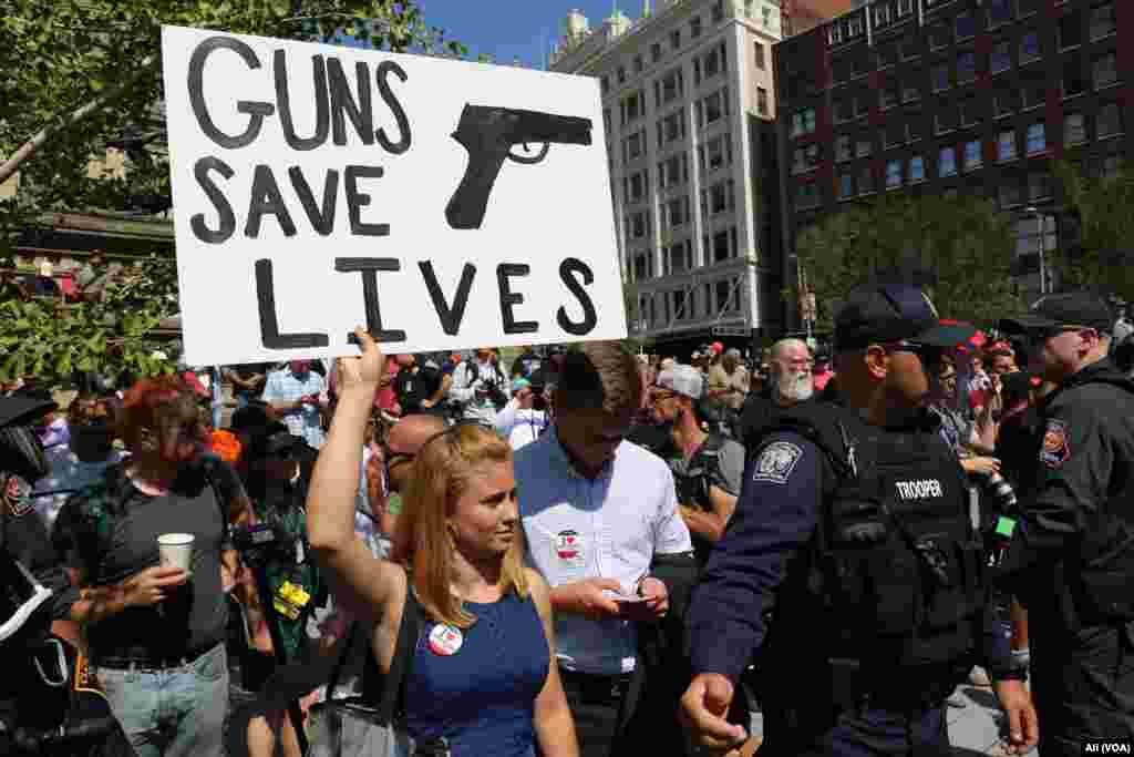 Hundreds of protesters converged in Public Square, prompting police to flood the area and keep the groups separated, in downtown Cleveland, July 19, 2016.