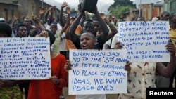 Protesters, who are against Burundi President Pierre Nkurunziza and his bid for a third term, march in Bujumbura, Burundi, June 4, 2015.