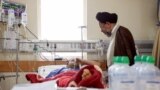 عیادت وزیر اطلاعات ایران از مجروحان حوادث تروریستی روز گذشته تهران<br />
عکس: مهدی قربانی