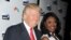 FILE - Donald Trump and Omarosa Manigault are seen at "The All-Star Celebrity Apprentice Event."