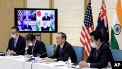 스가 요시히데 일본 총리가 3월 12일 화상으로 열린 '쿼드정상회의'에서 연설하고 있다.