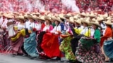 Participants in historical costumes attend the celebrations to mark the 114th anniversary of the Mexican Revolution, in Mexico City, Mexico, Nov. 20, 2024. 