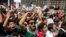 Fans celebrate Mexico's win during the Mexico vs. Germany World Cup soccer match, as they watched it on an outdoor screen in Mexico City, Mexico, June 17, 2018.