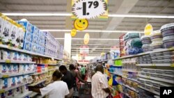 FILE - Customers shop at the Shoprite supermarket in the city's shopping mall in Accra, Ghana. Taken Oct. 11, 2007.