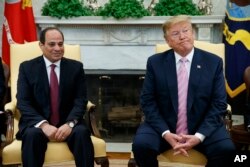 President Donald Trump meets with Egyptian President Abdel Fattah el-Sisi in the Oval Office of the White House, April 9, 2019, in Washington.