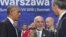 Afghan President Ashraf Ghani, center, speaks with U.S. President Barack Obama and NATO Secretary General Jens Stoltenberg at the NATO summit in Warsaw, Poland, July 9, 2016.