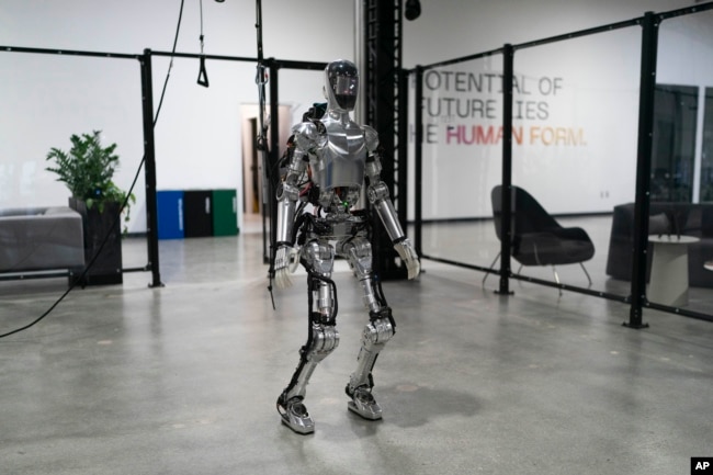 Humanoid robot Figure 01 is demonstrated at Figure AI's test facility in Sunnyvale, California on October 3, 2023. (AP Photo/Jae C. Hong)