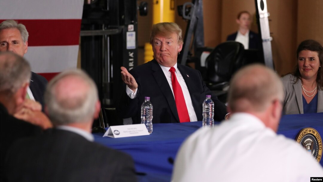 Presiden Donald Trump menghadiri diskusi tentang perdagangan di Duluth, Minnesota, 20 Juni 2018.