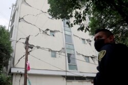 A damaged building is seen after an earthquake in Mexico City, Mexico, June 23, 2020.