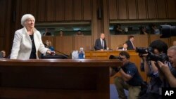 FILE - Federal Reserve Chairman Janet Yellen arrives on Capitol Hill in Washington to testify before the Senate Banking Committee, June 21, 2016.