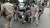 Phnom Penh's Prampi Makara district security guards dragged protesters from the gates of the Phnom Penh Municipal Court, Phnom Penh, Cambodia, July 24, 2020. (Hul Reaksmey/VOA Khmer)