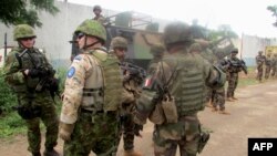 FILE - Soldiers of the European Union Force RCA (EUFOR RCA) patrol in Bangui, CAR, January 19, 2015.