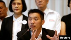 FILE - Thanathorn Juangroongruangkit, leader of the Future Forward Party talk during a news conference to form a "democratic front" in Bangkok, Thailand, March 27, 2019. 