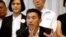 FILE - Thanathorn Juangroongruangkit, leader of the Future Forward Party talk during a news conference to form a "democratic front" in Bangkok, Thailand, March 27, 2019. 